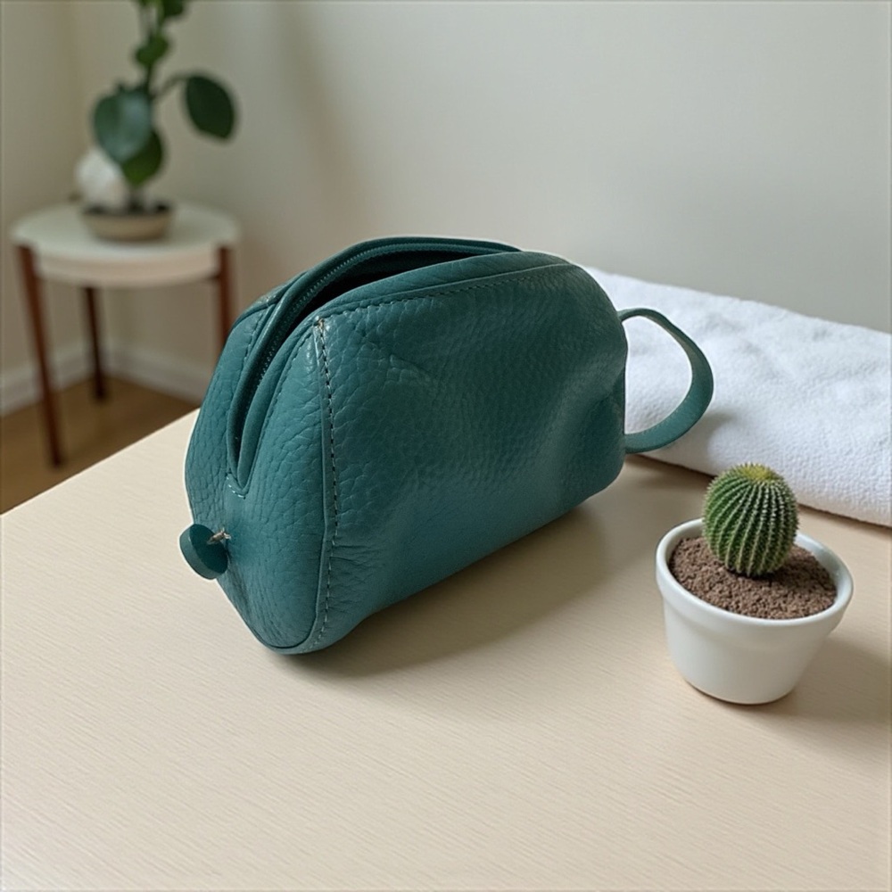 Adrienne Vittadini Teal wristlet leather bag